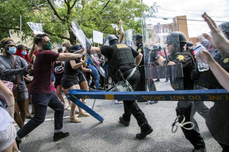 Protesters and police clash in Columbia, South Carolina on 31 May.