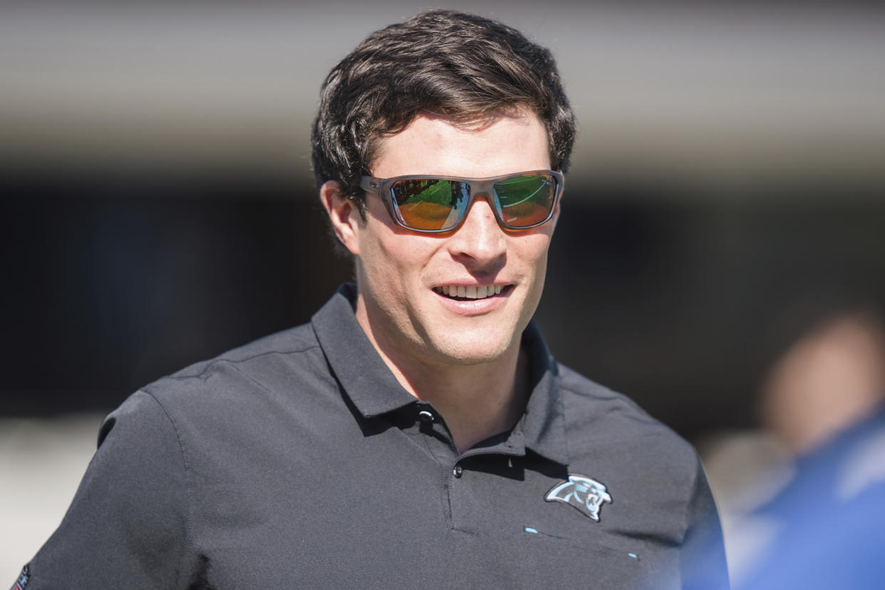 FILE - Former Carolina Panthers and Boston College football player Luke Kuechly watches warm ups before an NFL football game between the Carolina Panthers and the Tampa Bay Buccaneers Sunday, Oct. 23, 2022, in Charlotte, N.C. Kuechly was elected to the College Football Hall of Fame on Monday, Jan. 9, 2023. (AP Photo/Jacob Kupferman, File)