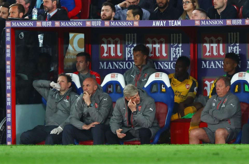 <p>Arsene Wenger can barely watch as his Arsenal side fall apart</p>