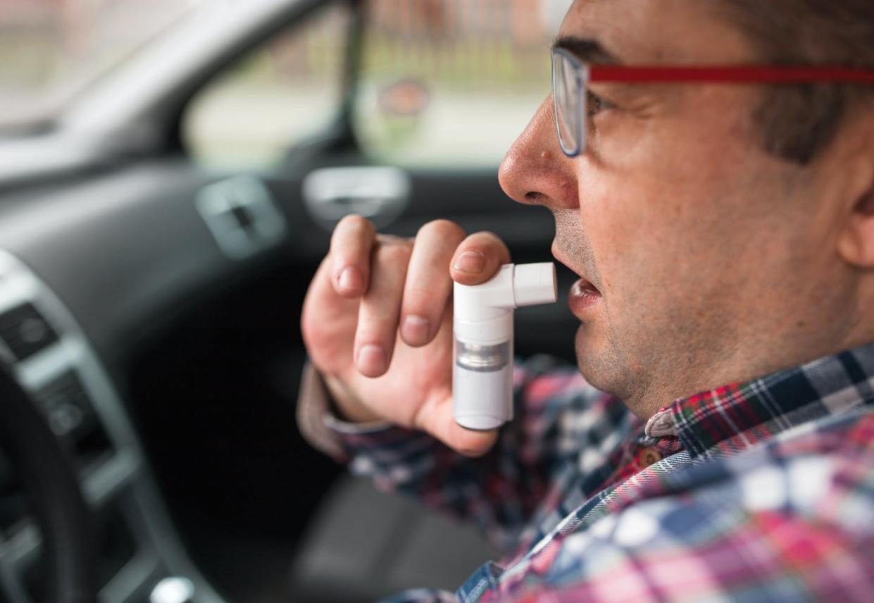 <span class="caption">Advance warning of high pollen levels could help people plan their activities to avoid allergies.</span> <span class="attribution"><a class="link " href="https://www.gettyimages.com/detail/photo/car-driver-using-asthma-inhaler-royalty-free-image/1304794626" rel="nofollow noopener" target="_blank" data-ylk="slk:Dobrila Vignjevic/E+ via Getty Images;elm:context_link;itc:0;sec:content-canvas">Dobrila Vignjevic/E+ via Getty Images</a></span>