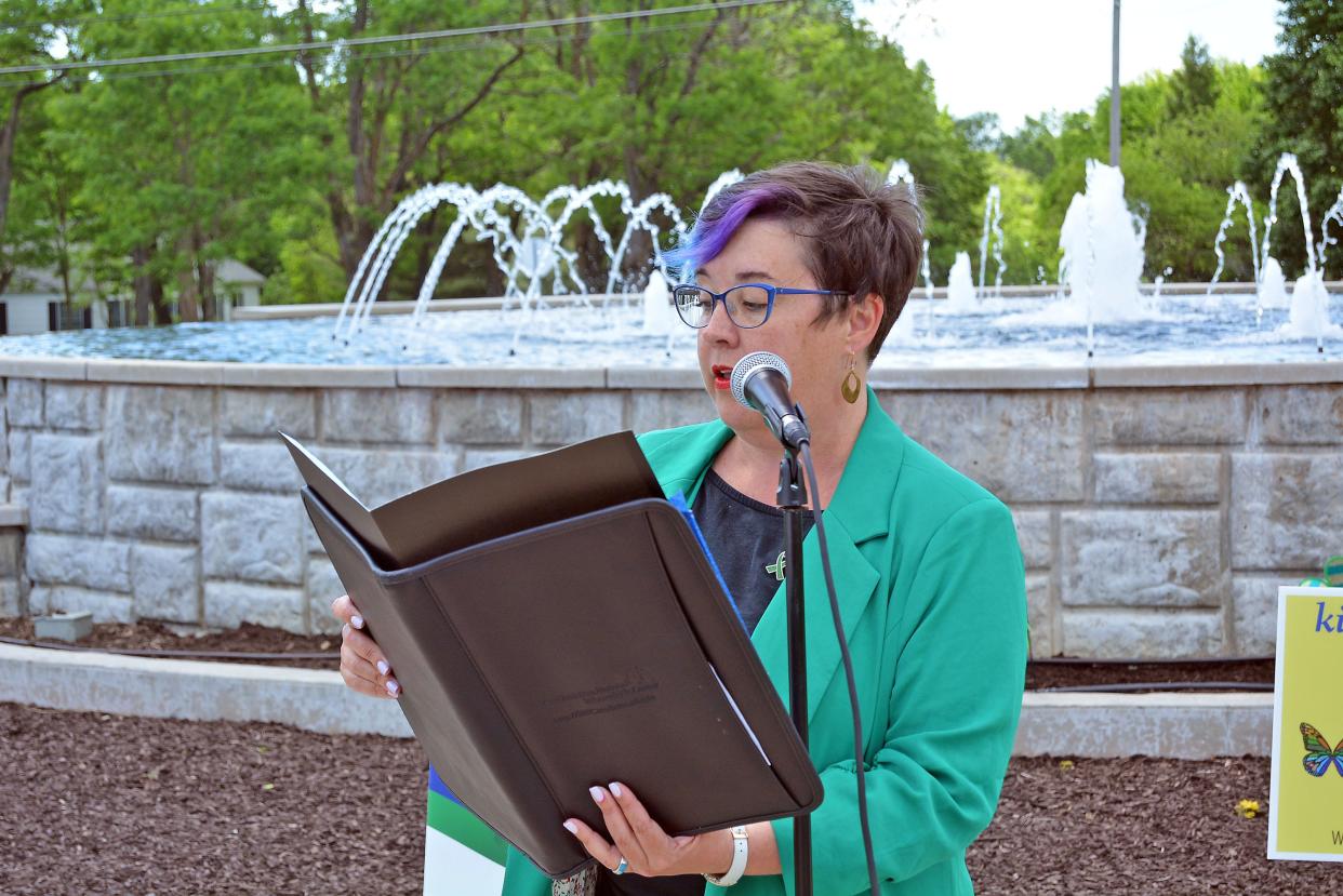 Columbia Mayor Barbara Buffaloe reads a proclamation Thursday recognizing Children's Mental Health Week from the Shelter Insurance fountain, which has hosted the proclamation event for the last four years.