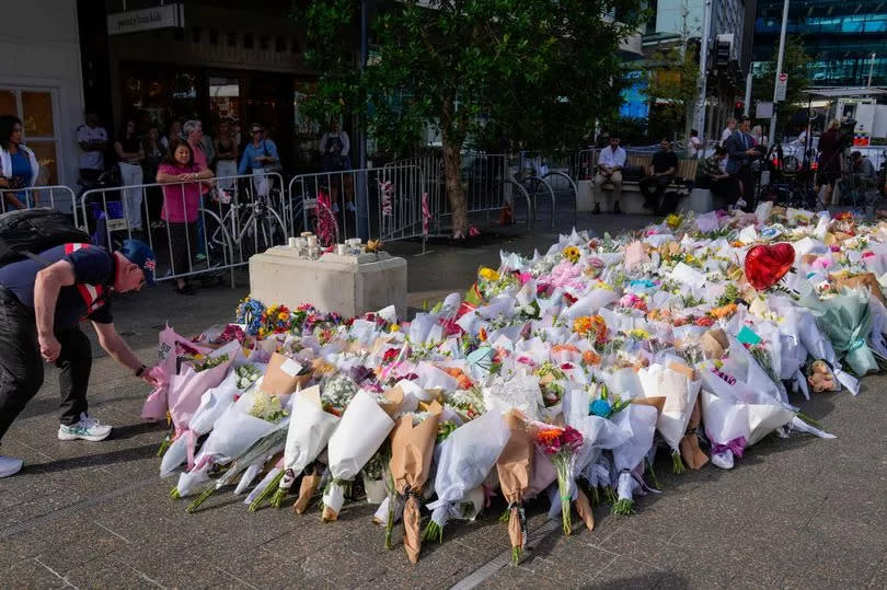 Floral tributes at Bondi Junction in Sydney where the tragic incident took place -Credit:AP