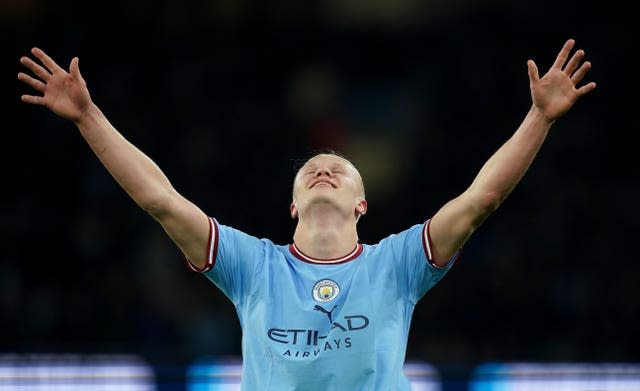 Manchester City striker Erling Haaland celebrates after setting a new Premier League goalscoring record. The prolific Norwegian enjoyed a stellar campaign following his high-profile transfer from Borussia Dortmund, with his history-making moment coming as City reclaimed top spot with a comfortable 3-0 win over West Ham in early May. Haaland's sweet left-footed chip over Lukasz Fabianksi was league goal number 35 of the season – surpassing the previous best mark held by Andy Cole and Alan Shearer