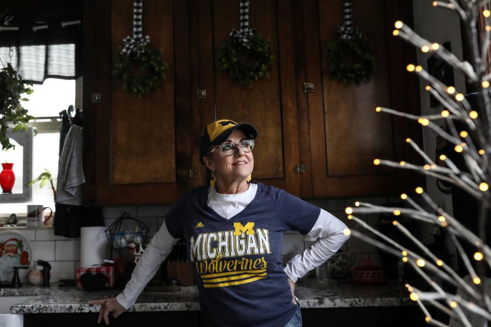 Diane Miller, 63, of Wyandotte, says she has worn the same thing every University of Michigan football game this season after a co-worker at Wyandotte hospital insisted she continue to wear it for good luck after Michigan won a game this season. Miller reflects on how she grew up watching Michigan football with her family and her mother, Winnie Burke, being the biggest fan in the room. “I wish she was here to see it,” Miller said.