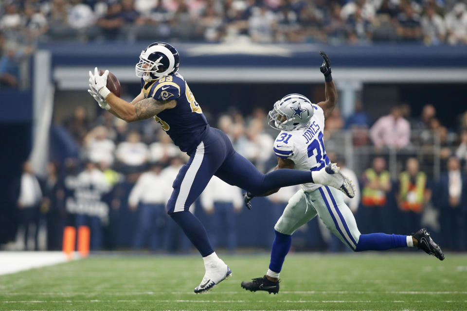 <p>Los Angeles Rams tight end Tyler Higbee (89) catches a pass against Dallas Cowboys safety Byron Jones (31) in the second quarter at AT&T Stadium. Mandatory Credit: Tim Heitman-USA TODAY Sports </p>