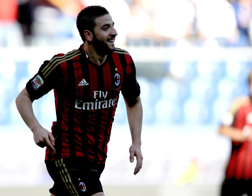 AC Milan's Adel Taarabt celebrates after scoring during a Serie A soccer match between Sampdoria and AC Milan, at the Luigi Ferraris stadium in Genoa, Italy, Sunday, Feb. 23, 2014. (AP Photo / Carlo Baroncini)