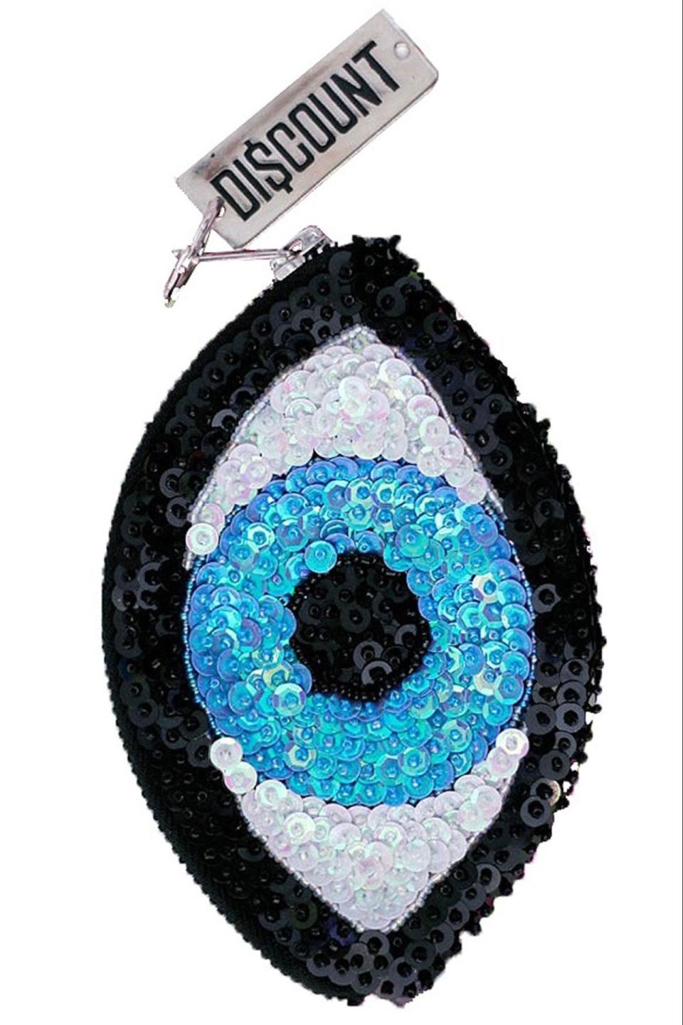 <p>Classic Evil Eye Wallet, $49, <a rel="nofollow noopener" href="https://di-count-universe.myshopify.com/products/classic-evil-eye-wallet" target="_blank" data-ylk="slk:di-count-universe.myshopify.com;elm:context_link;itc:0;sec:content-canvas" class="link ">di-count-universe.myshopify.com</a>. </p>