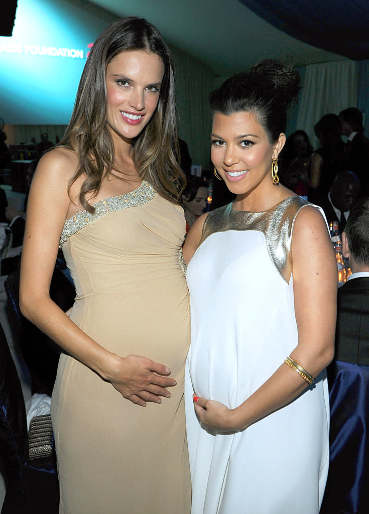 Victoria's Secret model Alessandra Ambrosio and reality "star" Kourtney Kardashian showed off their growing baby bumps at Elton John's yearly shindig.