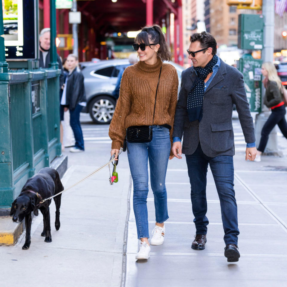 the two walking their dog in new york
