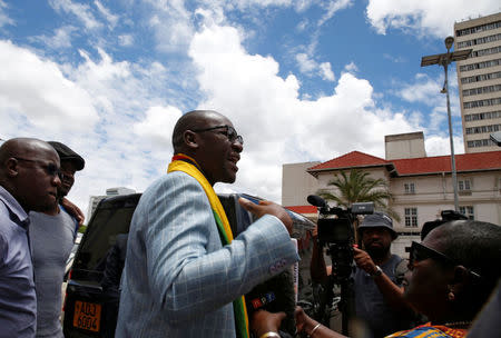Activist Pastor Evan Mawarire speaks to the media after being found not guilty of subversion in Harare, Zimbabwe, November 29,2017. REUTERS/Philimon Bulawayo