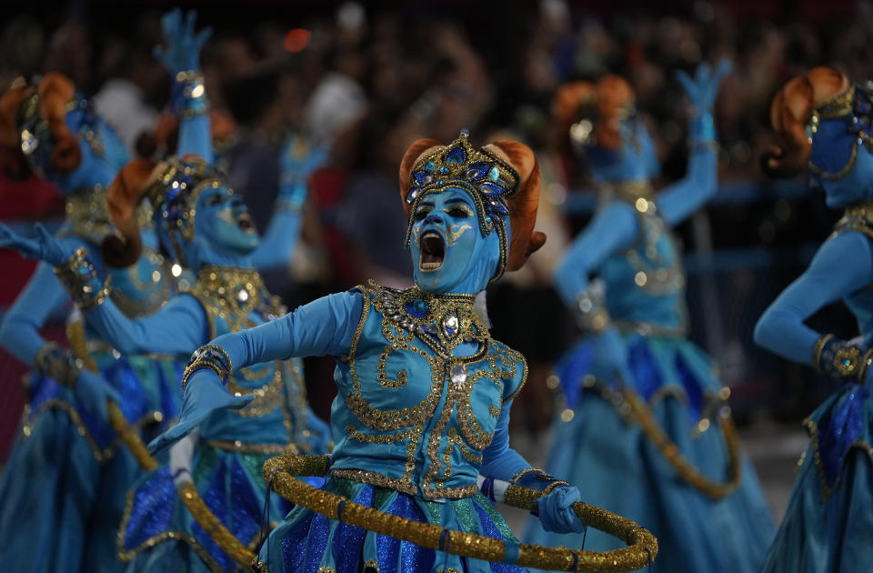 Performers from the Paraiso do Tuiuti samba school parade during Carnival celebrations at the Sambadrome in Rio de Janeiro, Brazil, Monday, Feb.20, 2023. (AP Photo/Silvia Izquierdo)