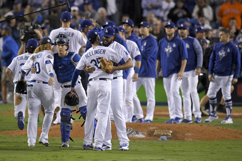 The Dodgers celebrate after their win against the Astros in Game 6 Tuesday. (AP)