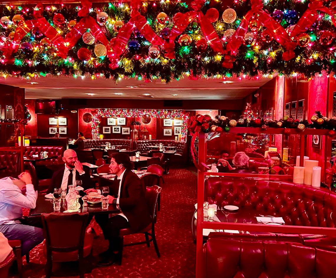 The classic decor (and, in this 2022 photo, Christmas decorations) at Durant’s steakhouse in Phoenix.
