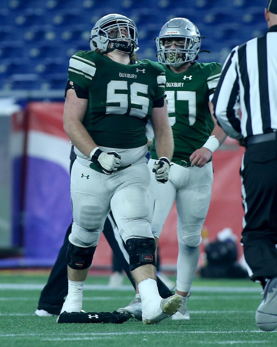 Duxbury's Nicholas Ayres celebrates his sack in the third quarter of their game against Grafton in the Division 4 Super Bowl at Gillette Stadium in Foxborough on Friday, Dec. 2, 2022. 