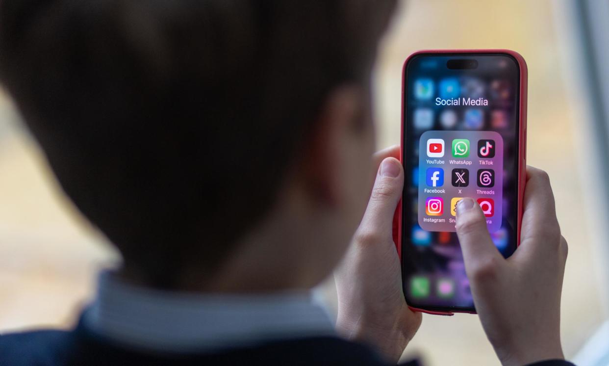 <span>What age did you give your child a mobile phone?</span><span>Photograph: Matt Cardy/Getty Images</span>