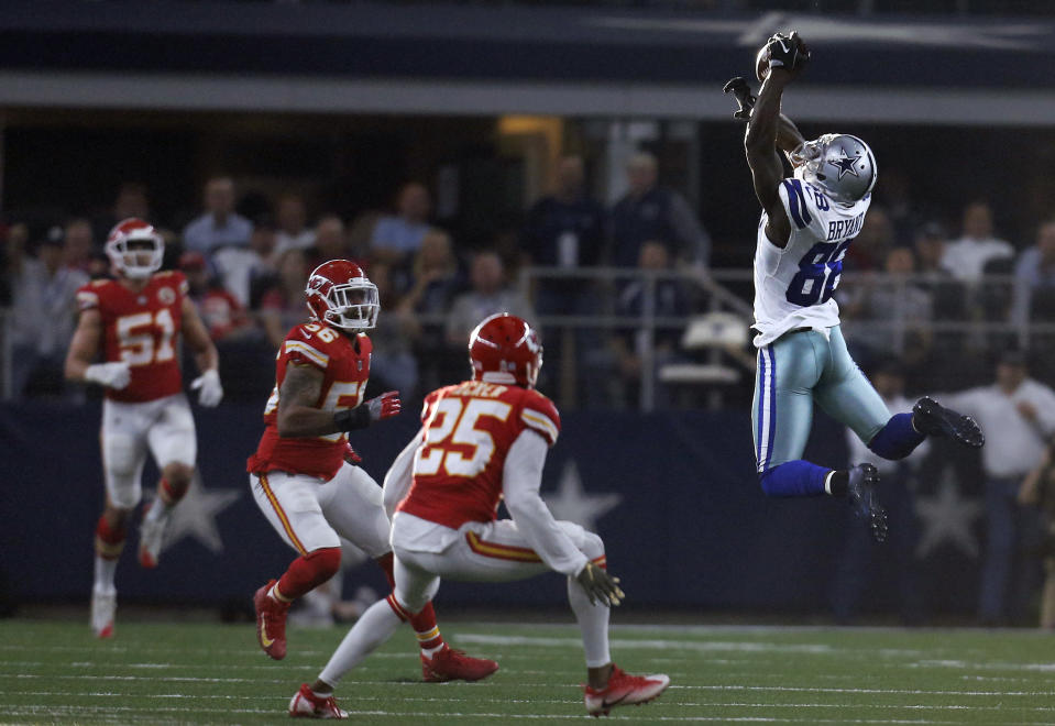 <p>Dallas Cowboys wide receiver Dez Bryant (88) reaches up to catch a pass as Kansas City Chiefs’ Derrick Johnson (56) and Kenneth Acker (25) defend in the first half of an NFL football game, Sunday, Nov. 5, 2017, in Arlington, Texas. (AP Photo/Brandon Wade) </p>