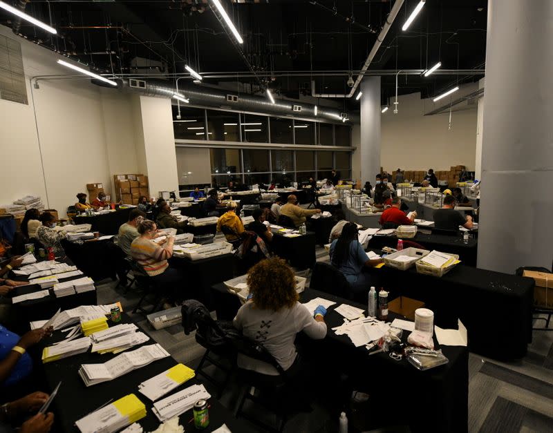 Employees of the Fulton County Board of Registration and Elections process ballots in Atlanta