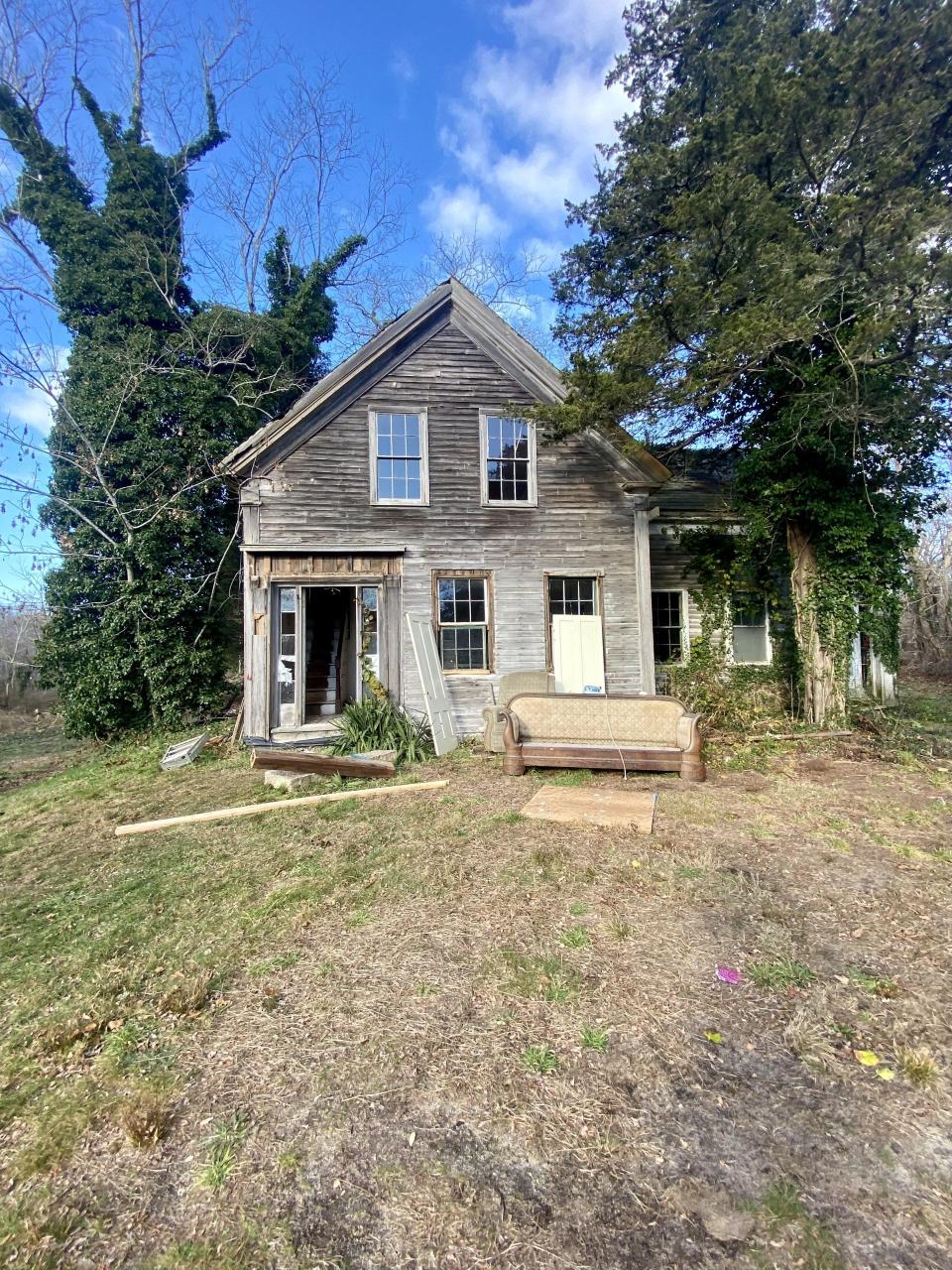 Pictured is the original 82 Monument Road house before it was demolished.