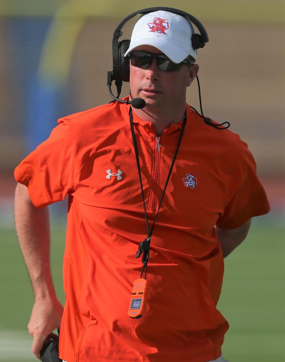 San Angelo Central High School head football coach Kevin Crane keeps his eye on the Bobcats during their spring game at San Angelo Stadium on Wednesday, May 18, 2022.