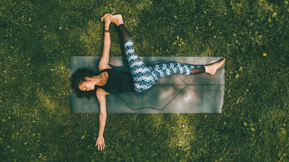 Aerial View of Woman doing Yoga in the Park.