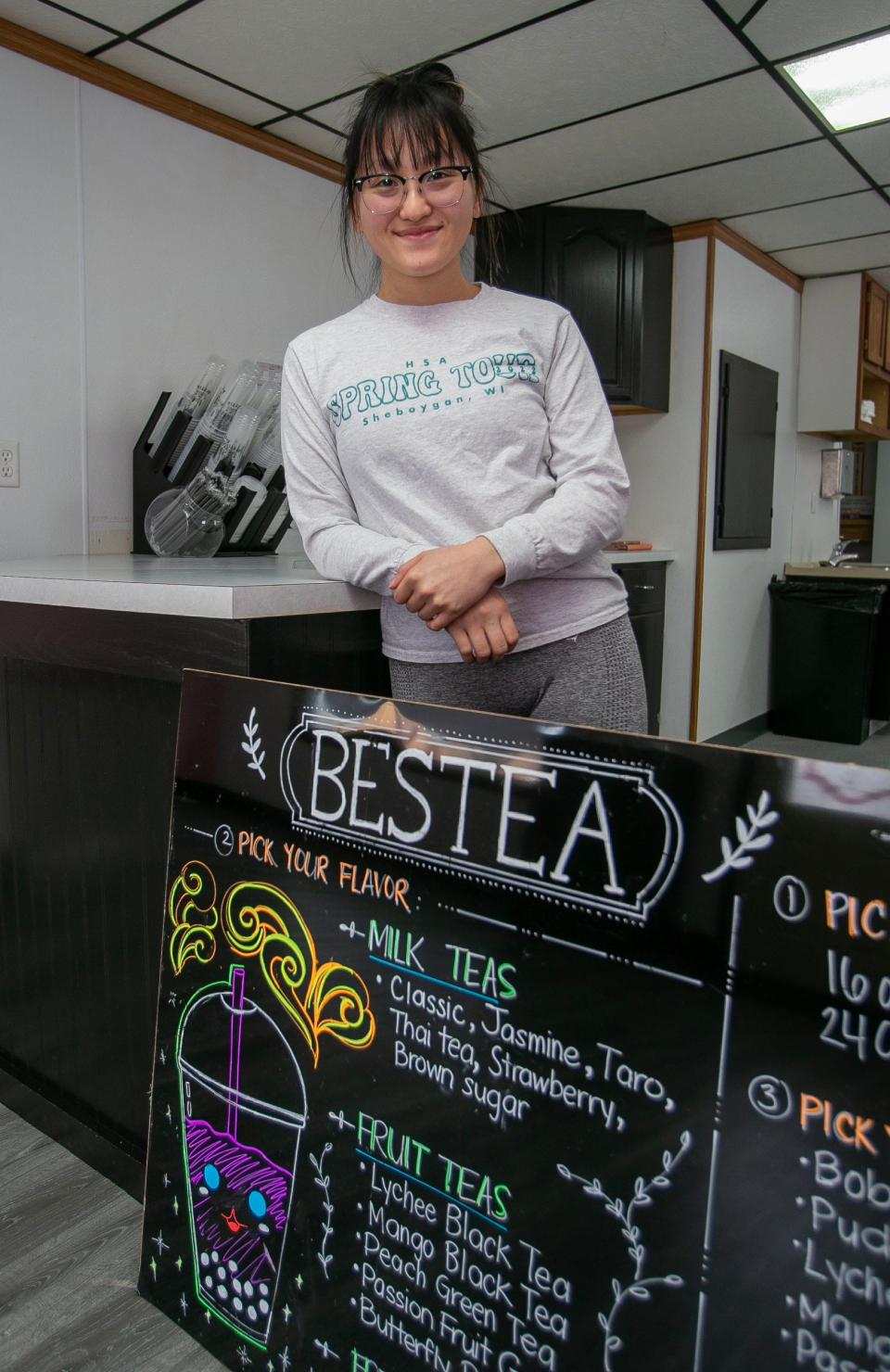 Lina Yang, the owner of BesTea in the 1300 block of Michigan Avenue, poses inside her store, Wednesday, March 15, 2023, in Sheboygan, Wis.