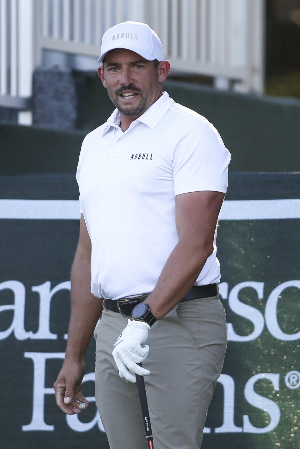 Scott Stallings reacts to his chip near the 18th green during the third day of the Sanderson Farms Championship golf tournament in Jackson, Miss., Saturday, Oct 7, 2023. (James Pugh/impact601.com via AP)