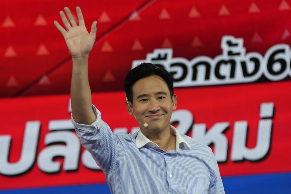 Move Forward Party leader Pita Limjaroenrat waves to his supporters during a debate hosted by Thailand's Channel 3 in Bangkok, Thailand, May 11, 2023. Voters disaffected by nine years of plodding rule by a coup-making army general are expected to deliver a strong mandate for change in Thailand's general election Sunday, May 14, 2023. (AP Photo/Sakchai Lalit)