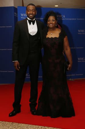 NBA basketball player John Wall and guest arrive on the red carpet for the annual White House Correspondents Association Dinner in Washington, U.S., April 30, 2016. REUTERS/Jonathan Ernst