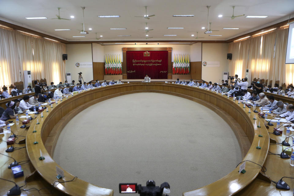 The Union Election Commission meets with representatives of various political parties Friday, May 21, 2021, in Naypyitaw, Myanmar. The head of Myanmar's military-appointed state election commission said Friday his agency will consider dissolving the former ruling party of Aung San Suu Kyi for its alleged involvement in electoral fraud, and have its leaders charged with treason. (AP Photo)
