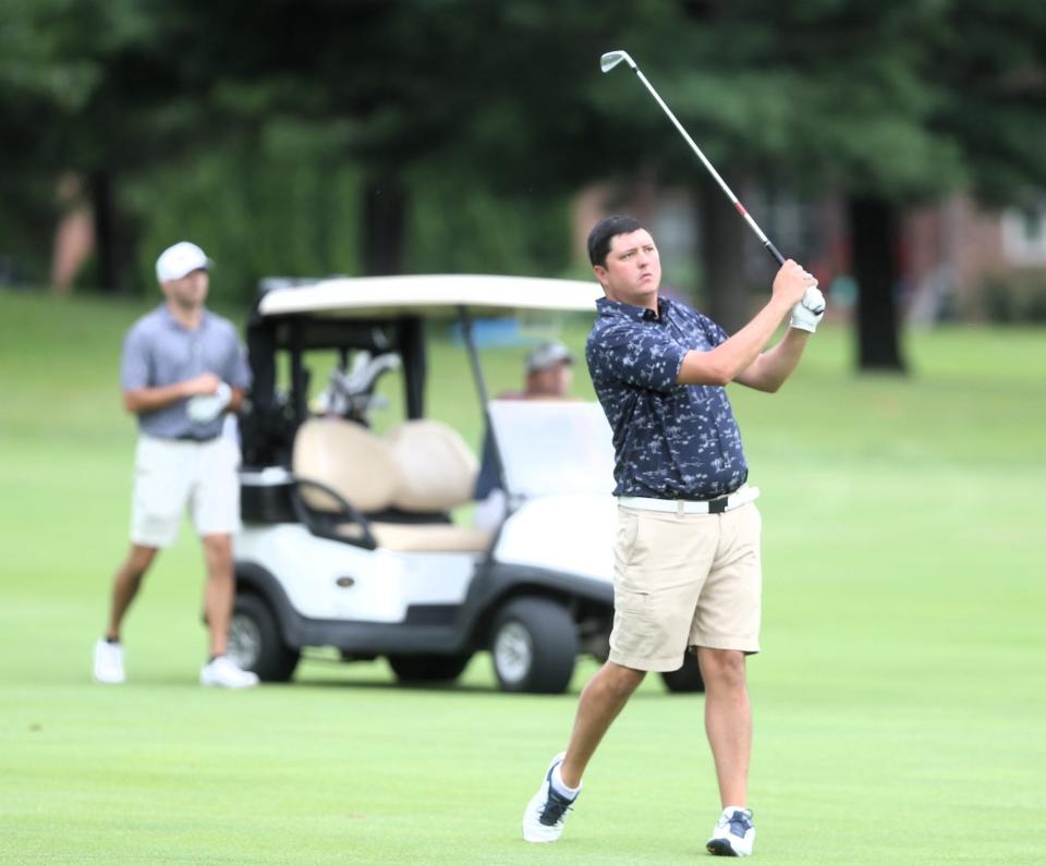 Blaine Buente hits the approach shot on No. 4 during the final round of the Men's City golf tournament at Panther Creek Country Club on Sunday, August 6, 2023.