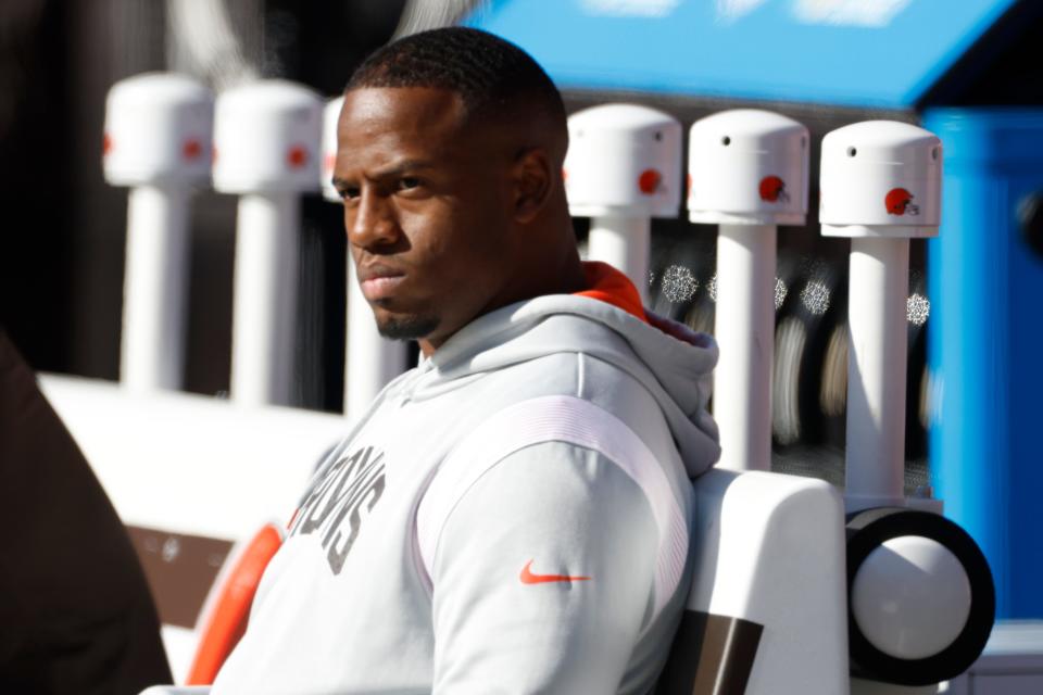 Browns running back Nick Chubb watches as players start to warm up before a game against the Chargers, Sunday, Oct. 9, 2022, in Cleveland.