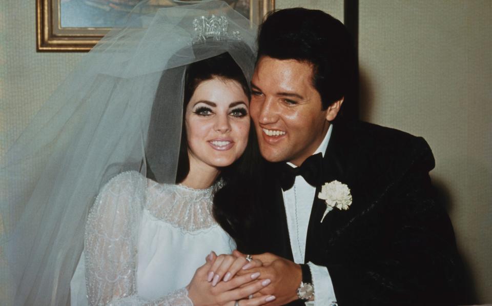 Presley with his wife Priscilla on their wedding day in 1967 - Getty