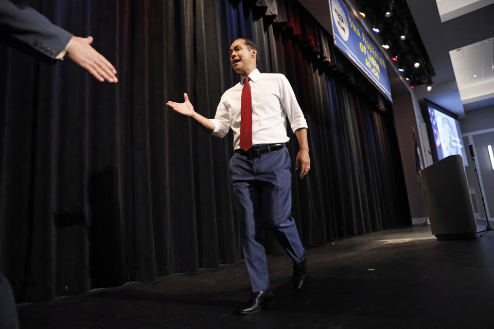 Democratic presidential candidate former U.S. Secretary of Housing and Urban Development Julian Castro walks off stage after speaking at the Iowa Federation of Labor convention, Wednesday, Aug. 21, 2019, in Altoona, Iowa. (AP Photo/Charlie Neibergall)