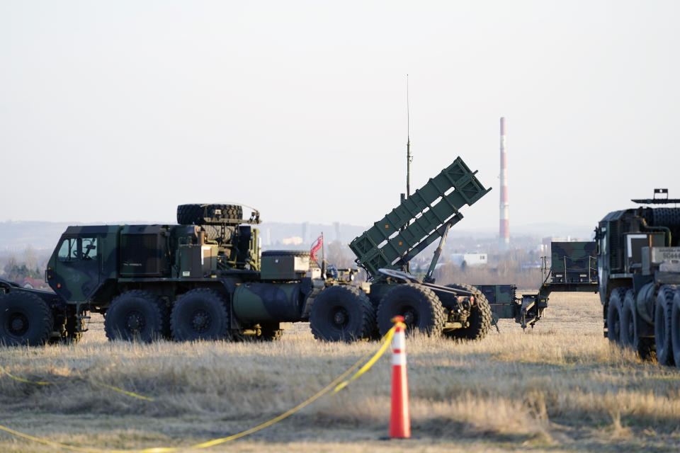 FILE - Patriot missles are seen at the Rzeszow-Jasionka Airport, March 25, 2022, in Jasionka, Poland, as President Joe Biden arrives to board Air Force One enroute to Warsaw, Poland. U.S. officials say the Biden administration is poised to approve sending a Patriot missile battery to Ukraine, finally agreeing to an urgent request from Ukrainian leaders desperate for more robust weapons to shoot down incoming Russian fire. (AP Photo/Evan Vucci, File)