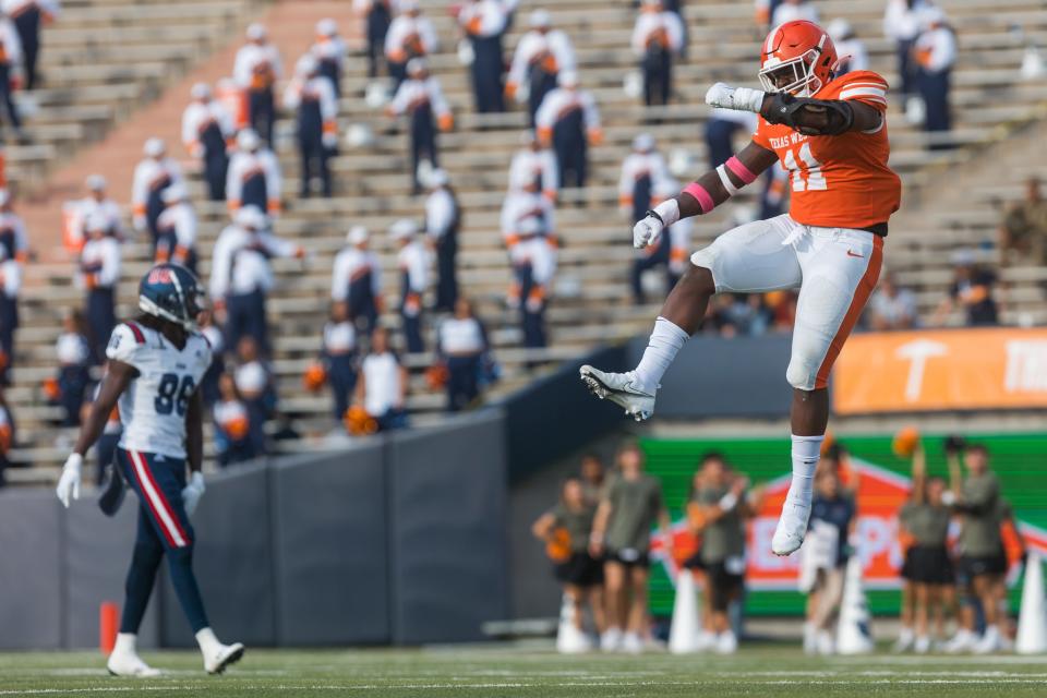 UTEP's Jadrian Taylor (11) celebrates at a football game against Florida Atlantic  at the Sun Bowl in El Paso, Texas, on Saturday, Oct. 22, 2022.