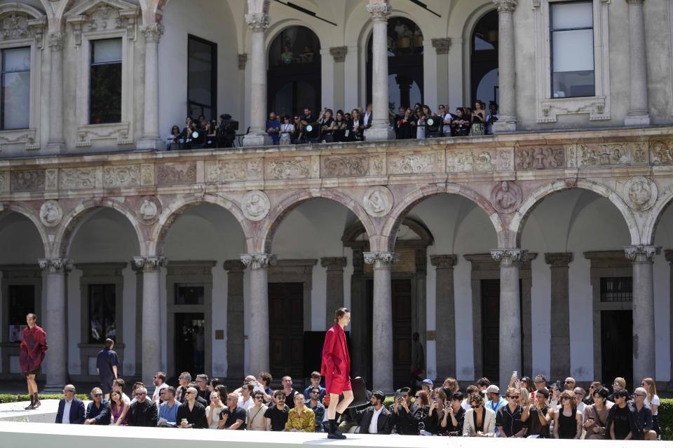 Models wear creations as part of the Valentino men's Spring Summer 2024 collection presented in Milan, Italy, Friday, June 16, 2023. (AP Photo/Luca Bruno)