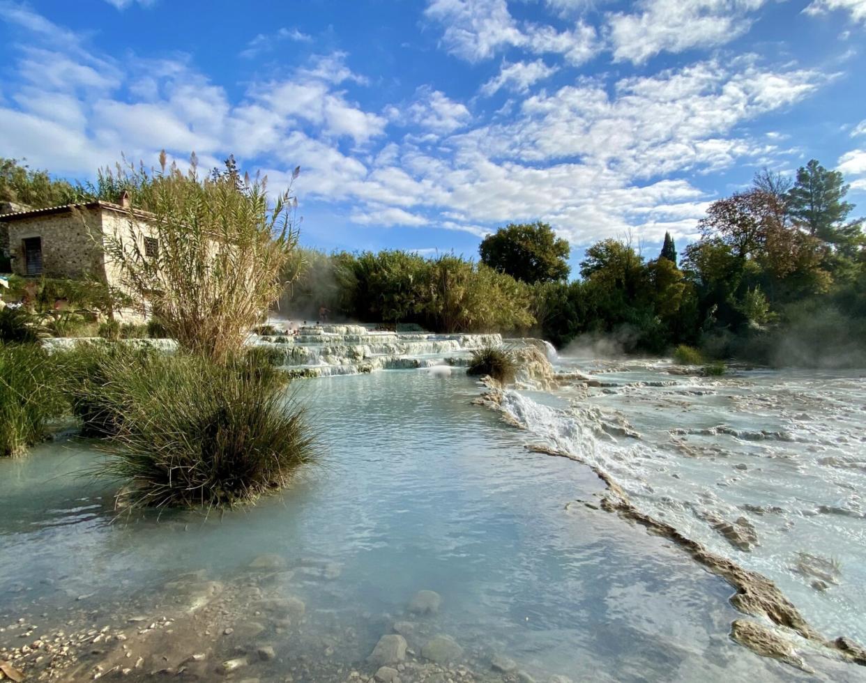 Saturnia hot springs is a small yet powerful place of relaxation in Italy. Learn more about the site and the important things to know before taking a trip there. pictured: a close up of the Saturnia hot spring