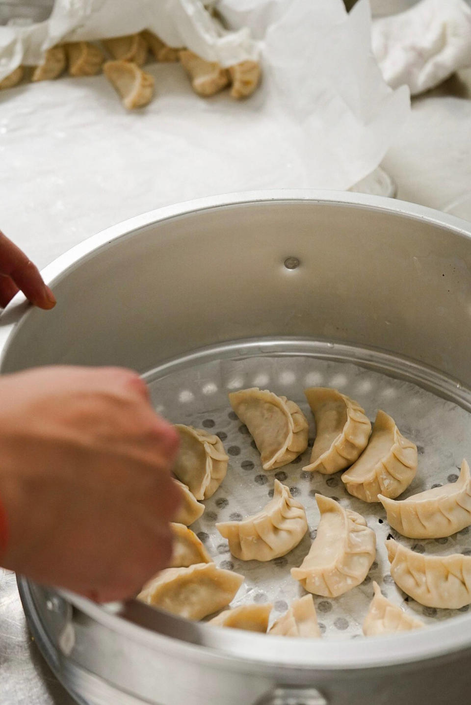 Hand-wrapped momos ready for steaming to order. (Manaal Shareh)