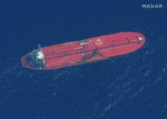This satellite image provided by Maxar Technologies shows the oil tanker Front Altair off the coast of Fujairah, United Arab Emirates, Monday, June 17, 2019. New satellite photos released Monday show two oil tankers apparently attacked in the Gulf of Oman last week. The U.S. alleges Iran used limpet mines to strike the two tankers. Iran has denied being involved. (Satellite image ©2019 Maxar Technologies via AP)