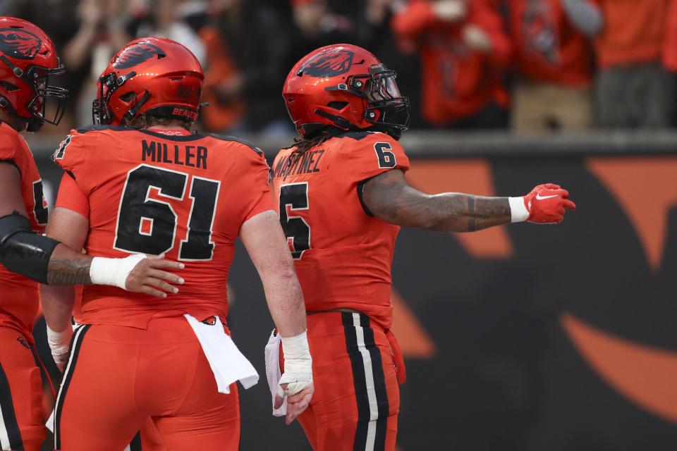 Oregon State’s Damien Martinez (6) celebrates after scoring a TD against Utah Friday, Sept. 29, 2023, in Corvallis, Ore. 