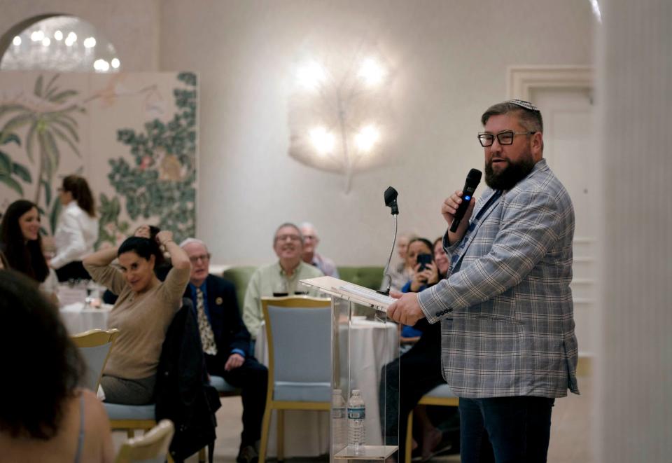 'Kosher Guru' Gabriel Boxer, talks about 'The Delicious Side of Jewish History' during a Jan. 30 event hosted The Chabad House at The Colony Hotel. Boxer discussed the origins of traditional Jewish dishes as guests dined on a seven-course meal.