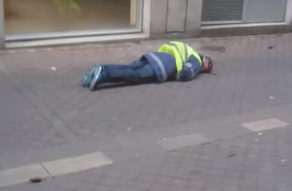 Mr Beziade is pictured lying on the ground after being shot in the head (Picture: France 3)