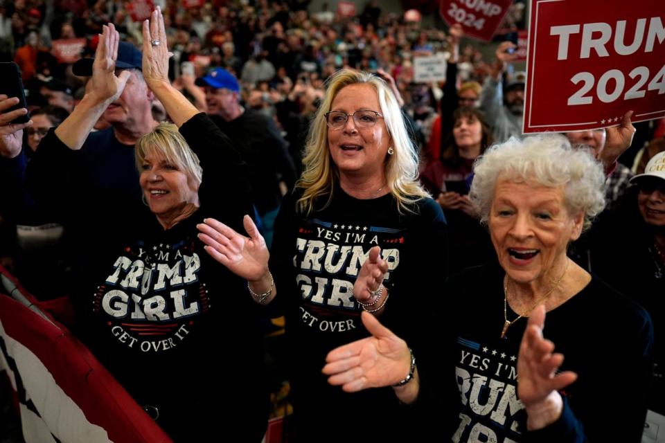 PHOTO: Supporters cheers as Republican presidential candidate former President Donald Trump speaks during a commit to caucus rally, Jan. 6, 2024, in Clinton, Iowa.  (Charlie Neibergall/AP)