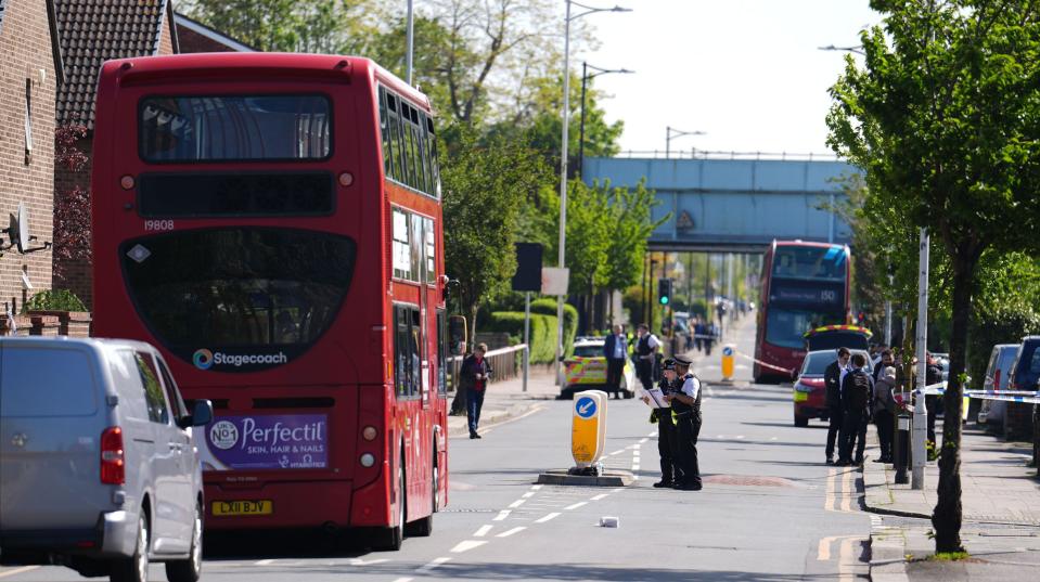 Police at the scene in Hainault, north east London, after reports of several people being stabbed at a Tube station. A 36-year-old man wielding a sword was arrested following the attack on members of the public and two police officers. Picture date: Tuesday April 30, 2024.