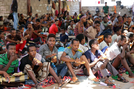 African migrants sit in a deportation center in Aden, Yemen March 17, 2018. Picture taken March 17, 2018. REUTERS/Fawaz Salman