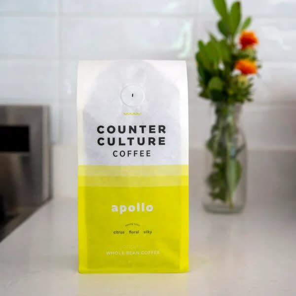 counter culture coffee yellow bag on white background