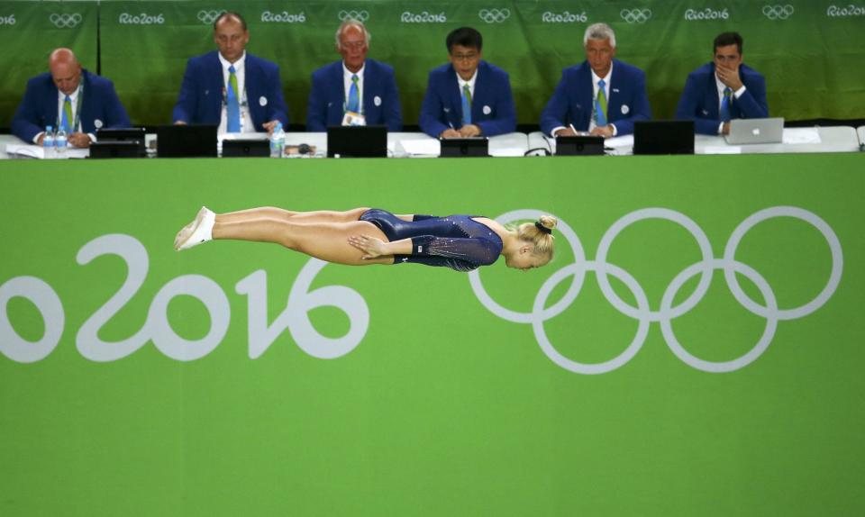 <p>Nicole Ahsinger (USA) of USA competes. (Reuters) </p>