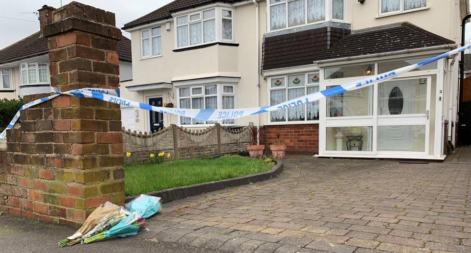 PABest Flowers outside the house on Boundary Avenue in Rowley Regis, West Midlands, where a woman in her 80s died after being attacked by two escaped dogs