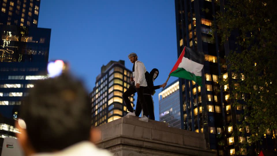 Demonstrators gather in New York's Columbus Circle in support of Palestinians on Friday, November 10. - Laura Oliverio/CNN
