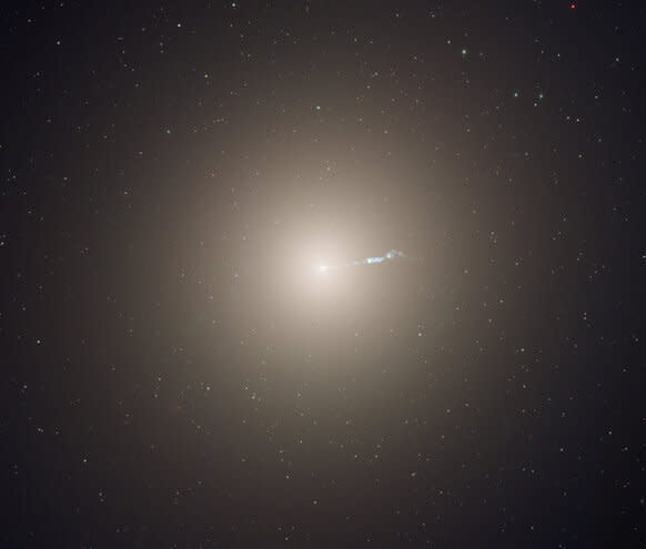  The elliptical galaxy M87 has a supermassive black hole in its heart (far too small to be seen in this Hubble image). 